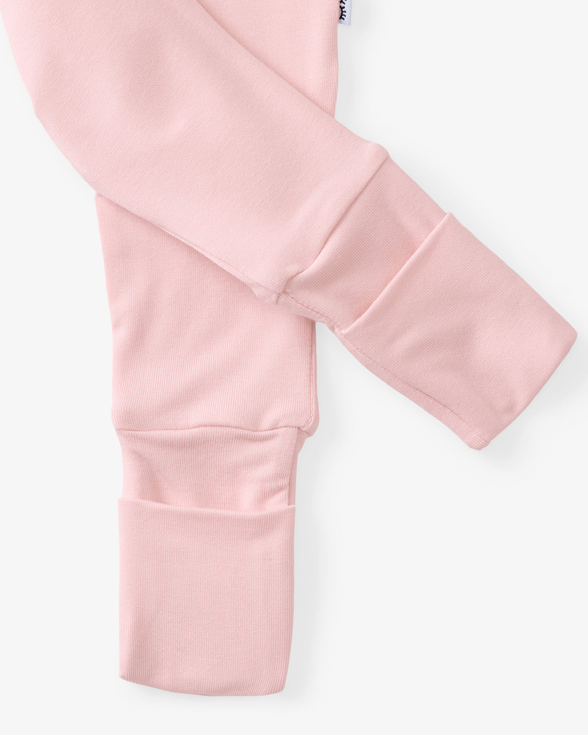 Close up flat lay of the leg opening on the Prima Pink Fold-Over Legging
