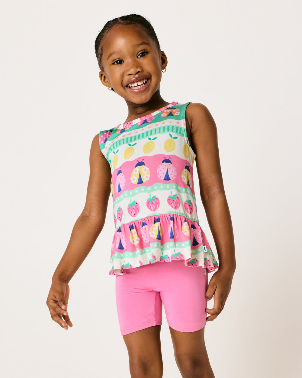 Close up of child wearing the Sweet Pink Bike Shorts with a tank top