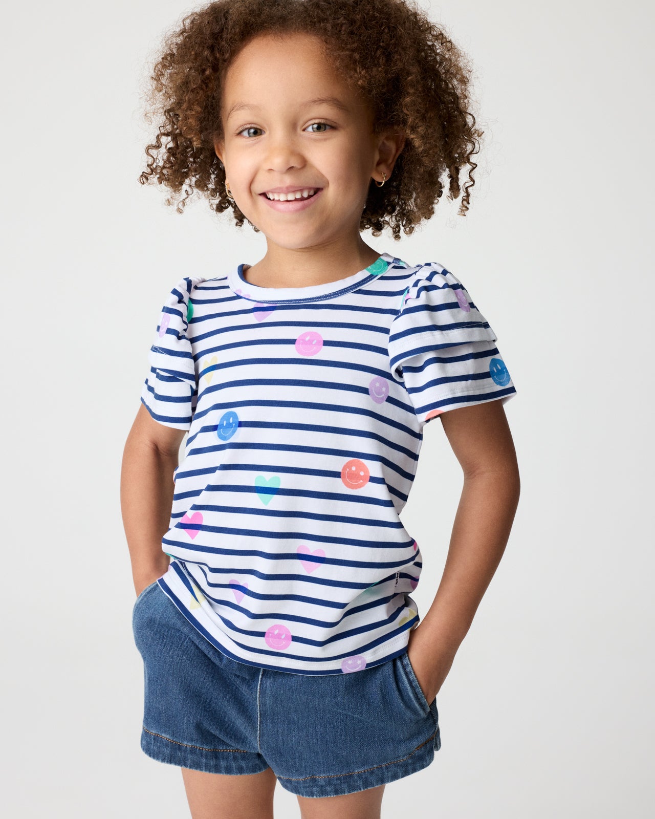 Close up of girl wearing the Smiley Stripes Double Flutter Tee