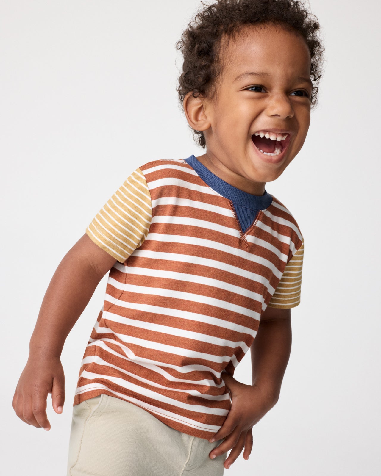 Boy wearing the Golden Amber Heather Stripe Relaxed Tee