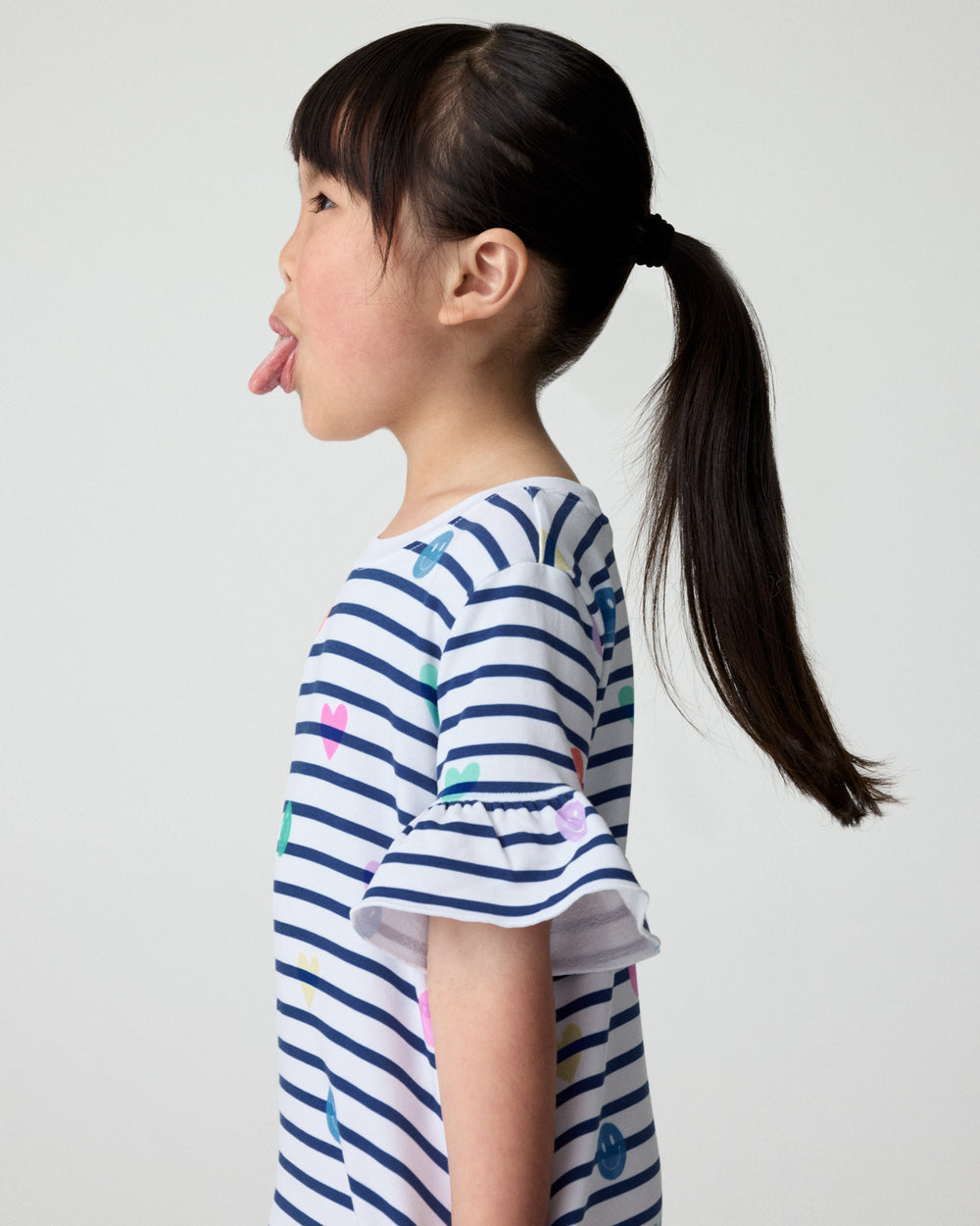 Close up of the sleeve detail on the Smiley Stripes Ruffled Shift Dress