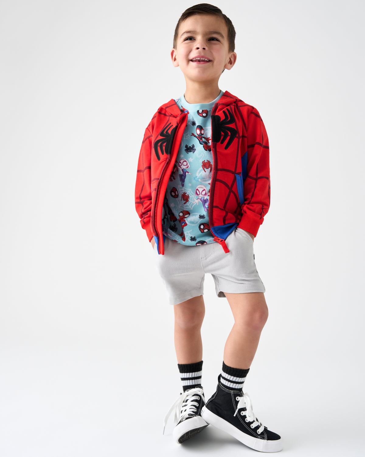 Boy wearing the Spidey Zip Hoodie with gray boys shorts