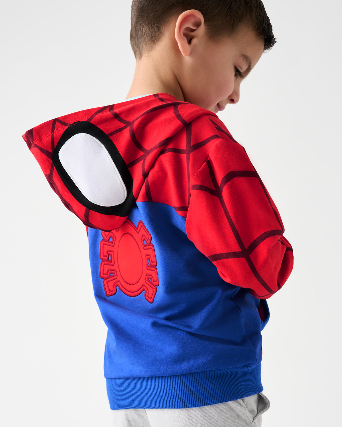 Back view of boy wearing the Spidey Zip Hoodie