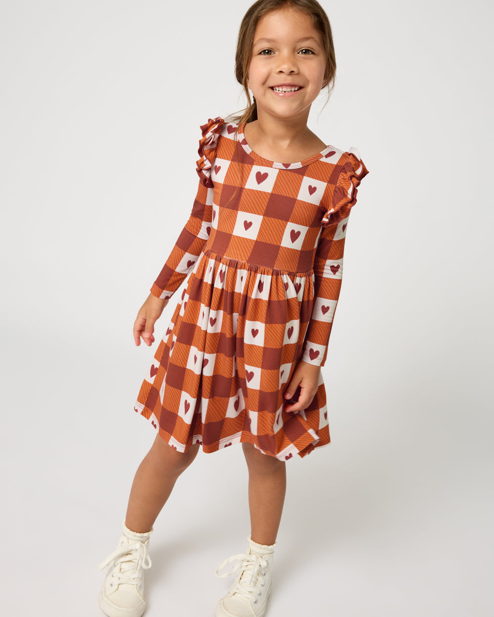 Girl wearing the Harvest Hearts Flutter Skater Dress