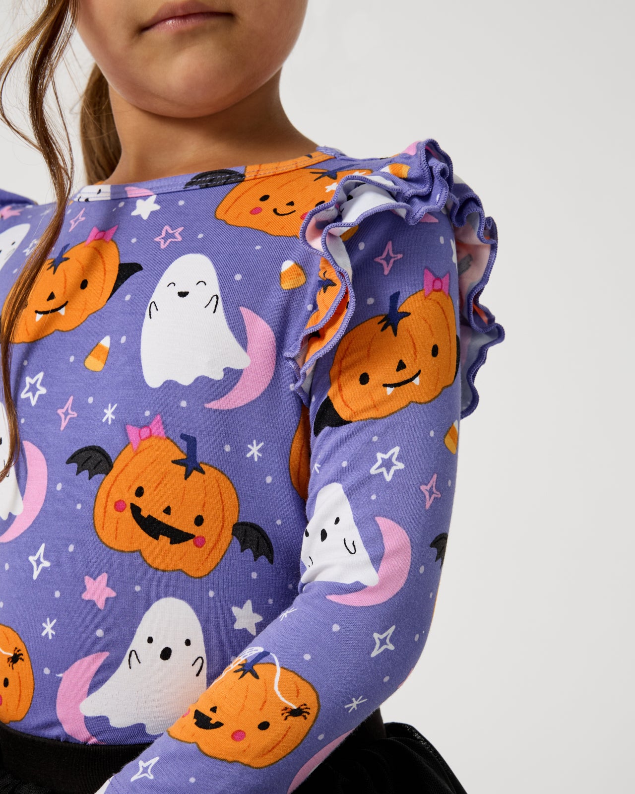 Close up of the flutter shoulder detail on the Moonlit Magic Purple Flutter Tee