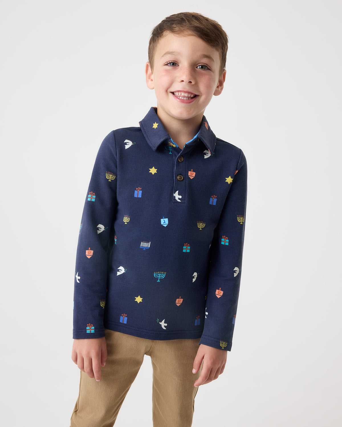 Boy wearing the Hanukkah Wishes Polo Shirt with khaki pants