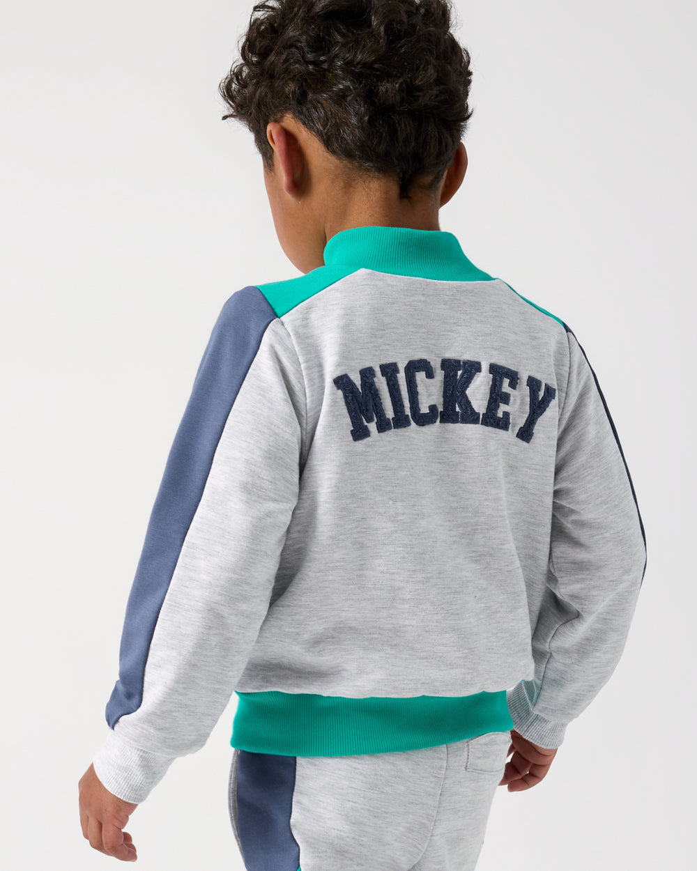 Back view of child wearing the Disney Mickey Mouse Sports Club Track Jacket