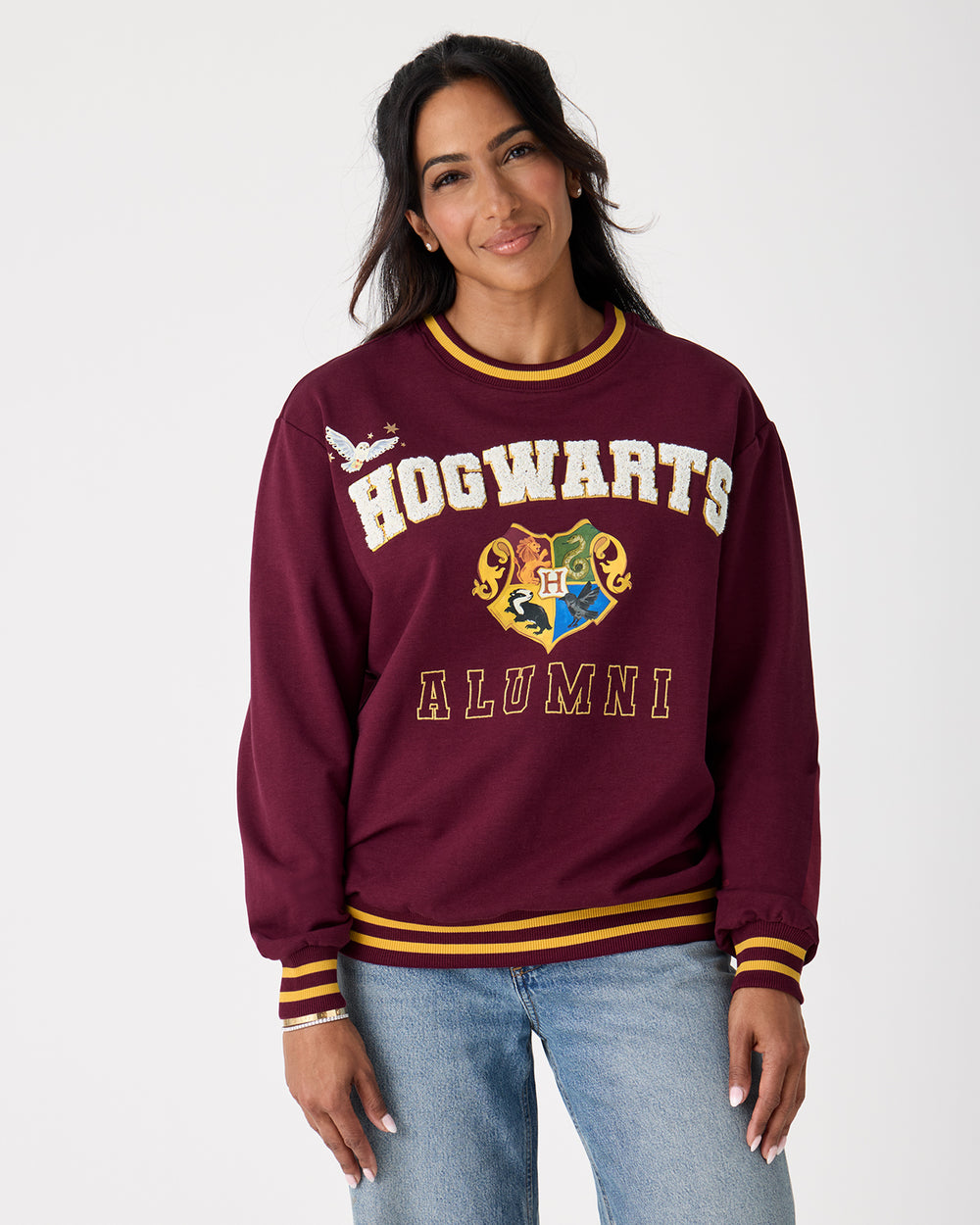 Woman wearing the Harry Potter™ Spellbinding Studies Adult Crewneck Sweatshirt