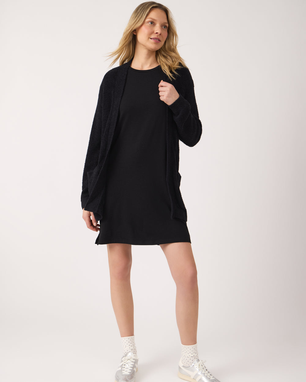 Woman wearing the Black Women's Lounge Dress with a cardigan
