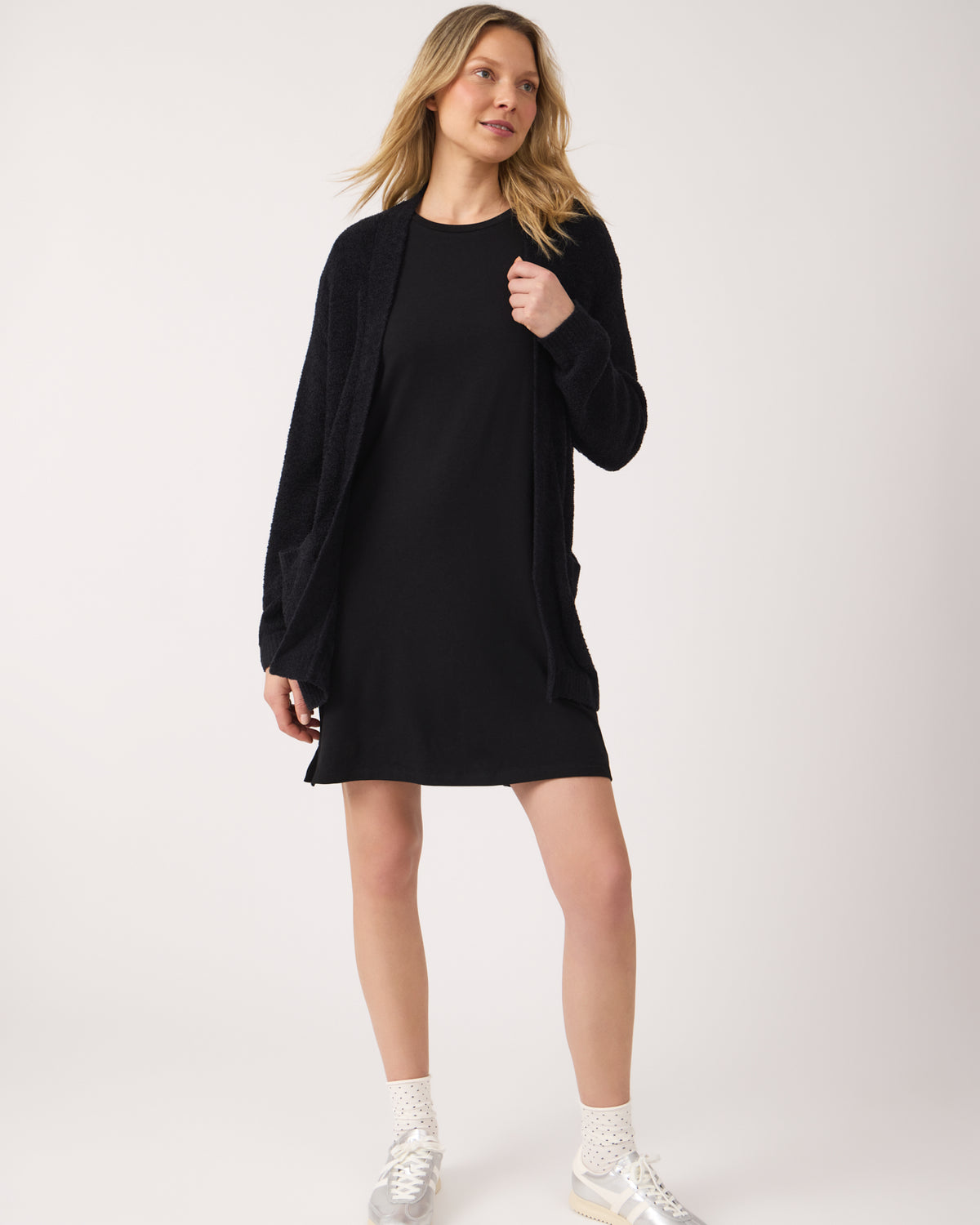 Woman wearing the Black Women's Lounge Dress with a cardigan
