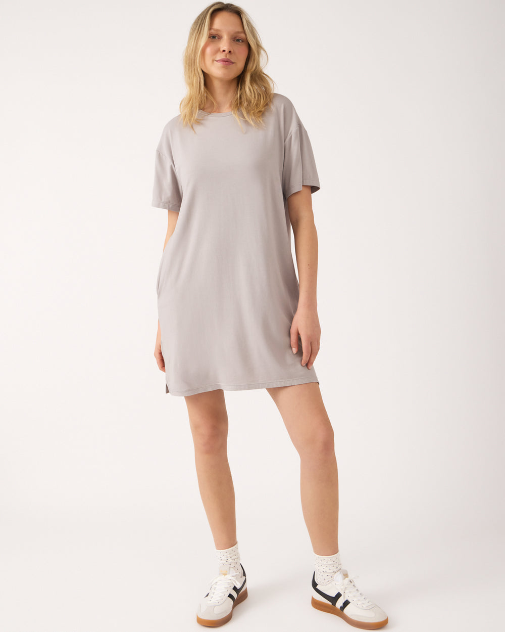 Woman wearing the Dove Gray Women's Lounge Dress with white lifestyle sneakers