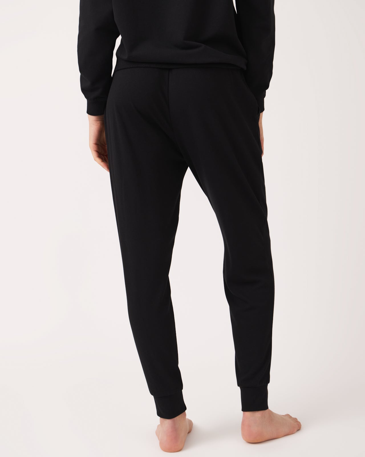Back view of woman wearing the Black Women's Everyday Jogger
