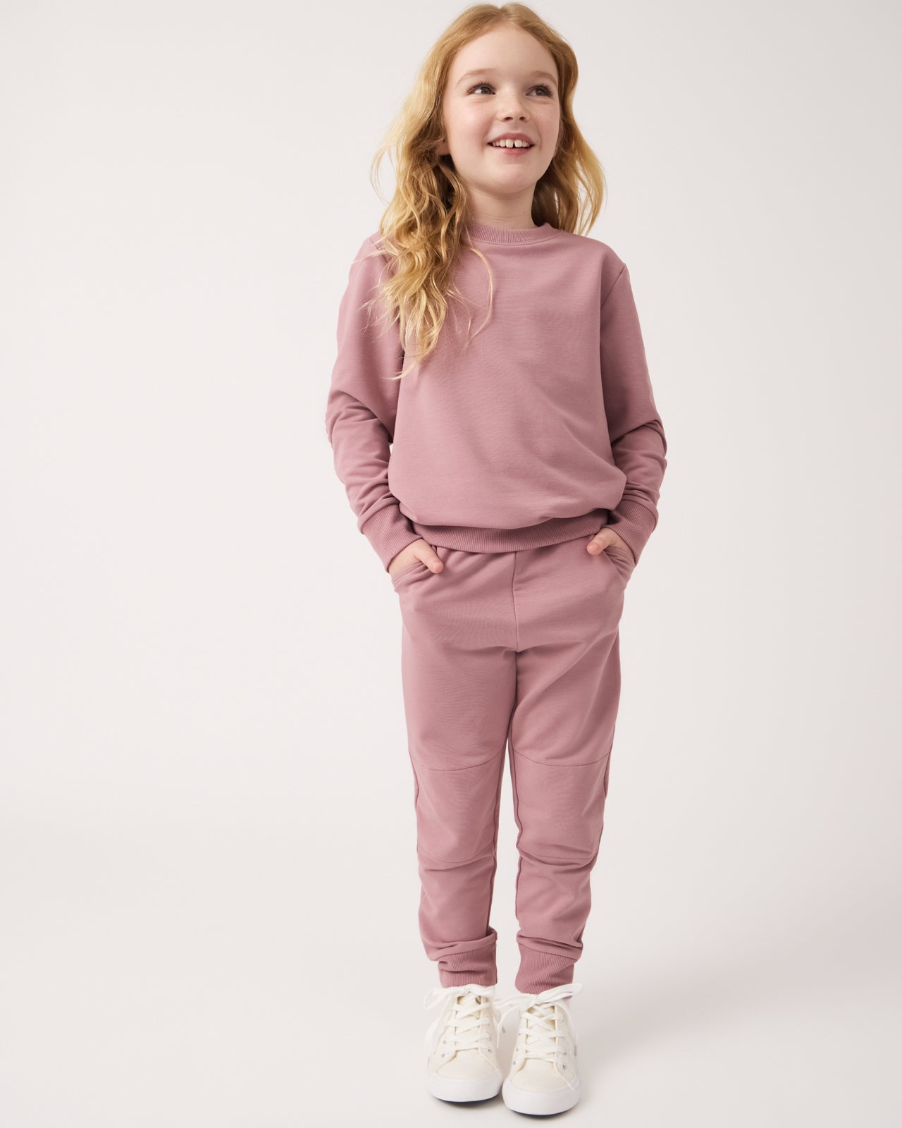 Girl wearing the Rosewood Jogger with her hands in the pockets