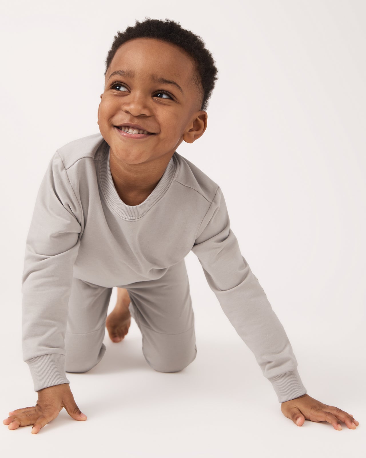 Crawling boy wearing the Dove Gray Crewneck Sweatshirt