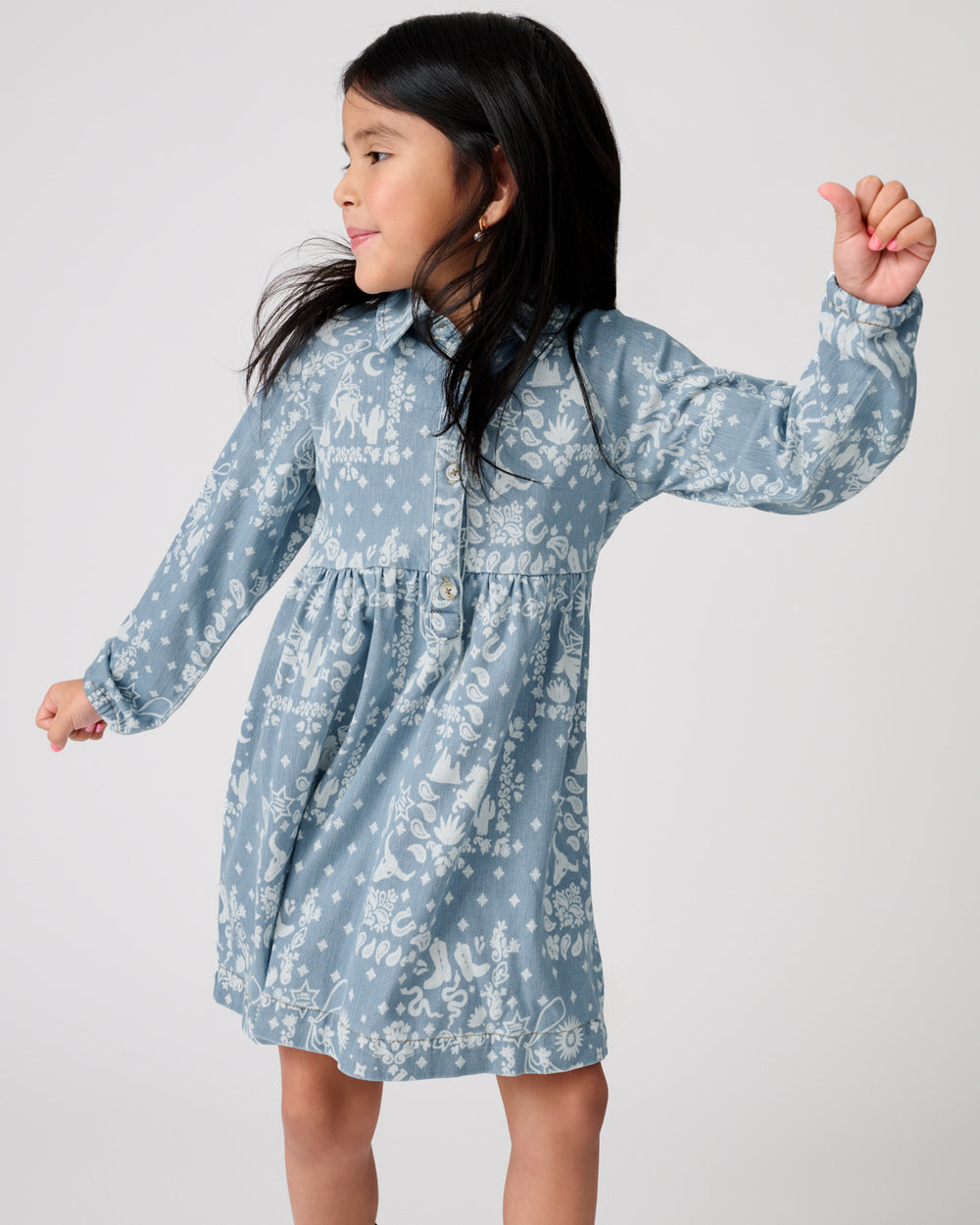 Child in motion wearing the Bandana Blues Denim Shirt Dress
