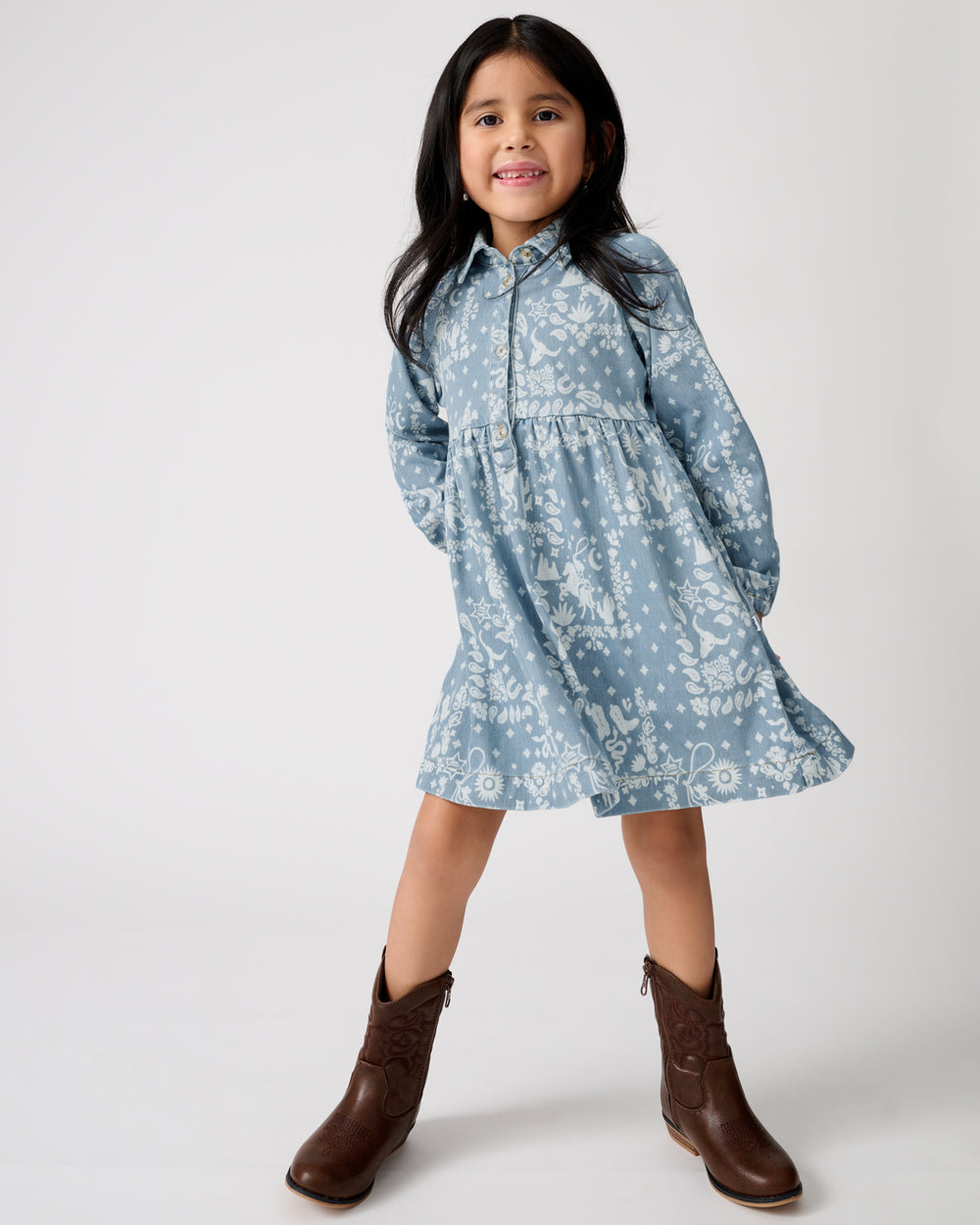 Standing girl wearing the Bandana Blues Denim Shirt Dress