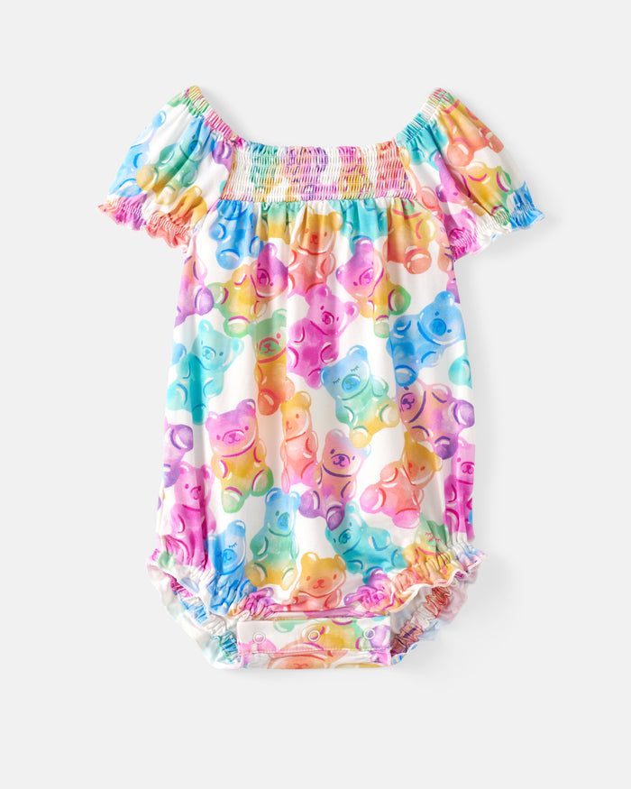 Flat lay of the Gummy Giggles Smocked Bubble Romper