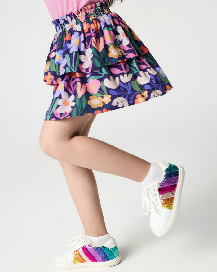 Running girl wearing the Wild Garden Tiered Skort