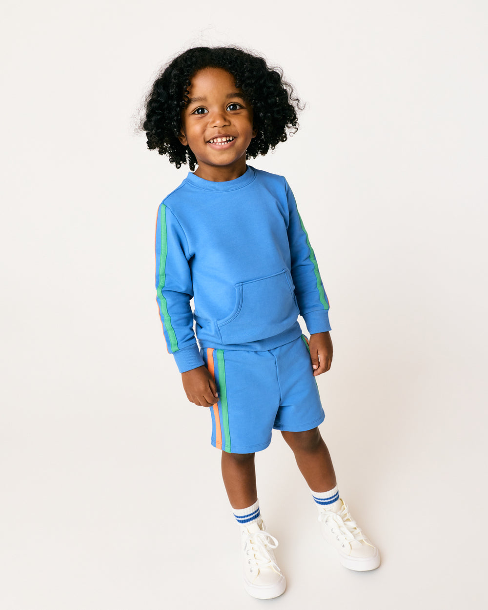 Alternate boy wearing the Major Blue Pocket Crewneck and shorts