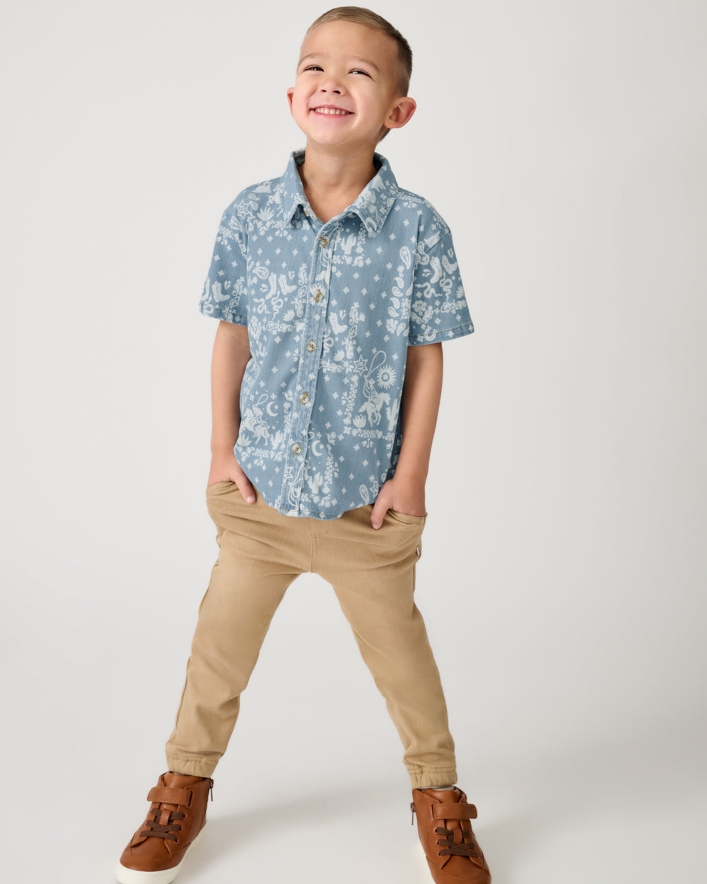 Child wearing the Bandana Blues Denim Button Down Polo with denim joggers