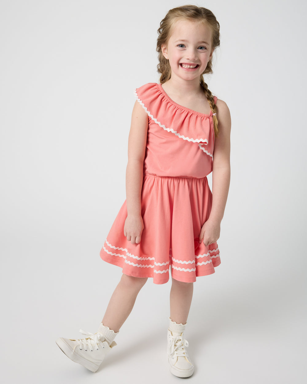 Girl wearing the Beach Coral Asymmetrical Dress