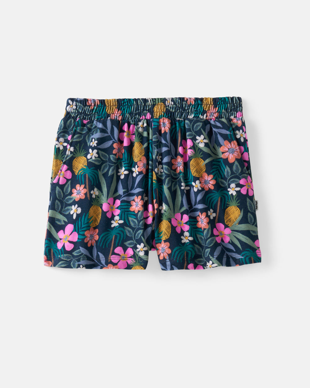 Flat lay of the Tropical Garden Smocked Shorts