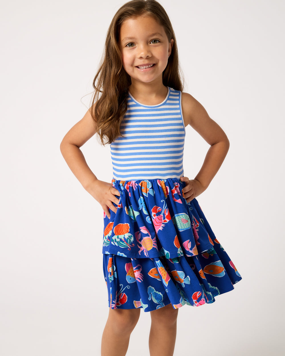Girl wearing the Tidepool Party Tiered Dress