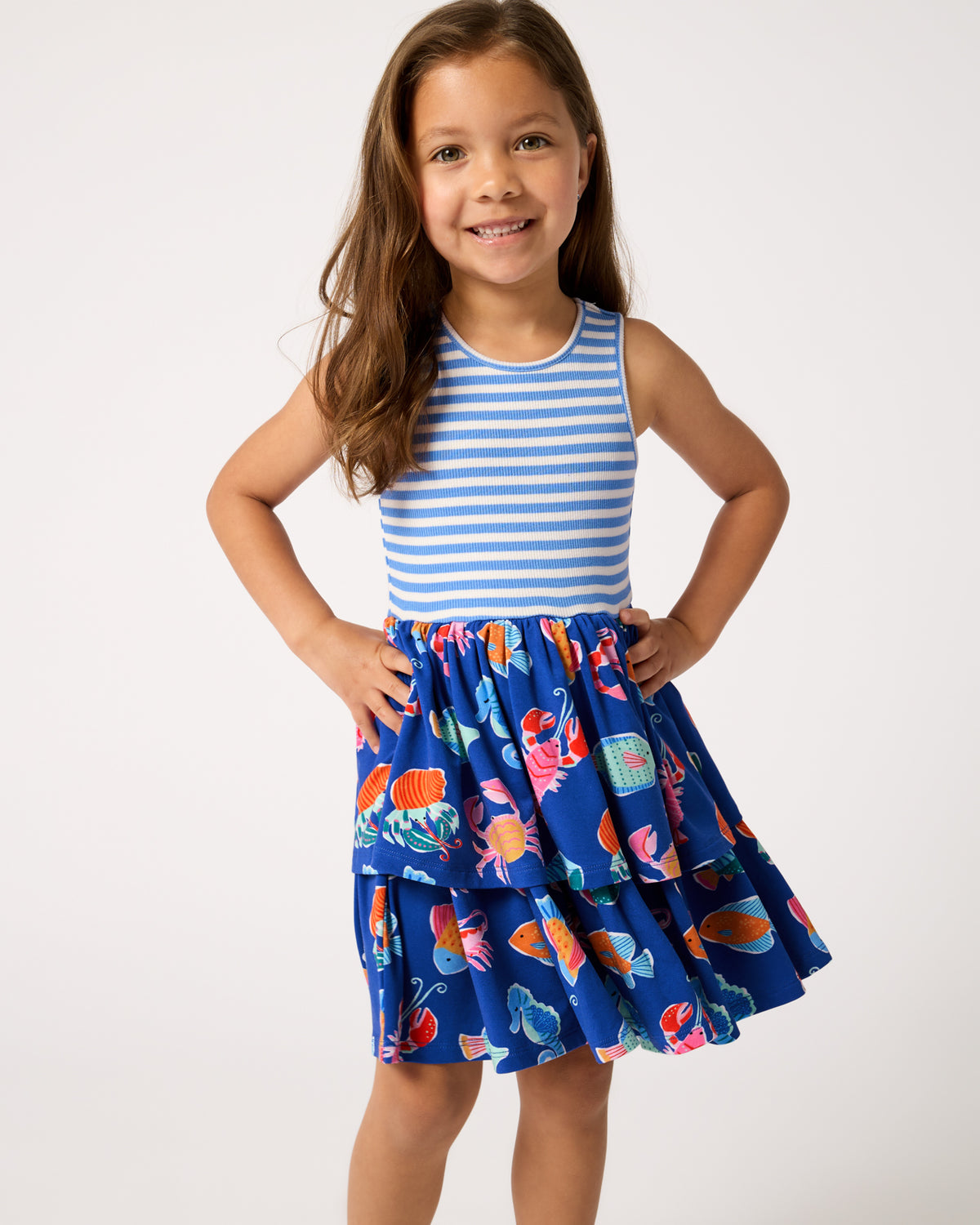 Girl wearing the Tidepool Party Tiered Dress