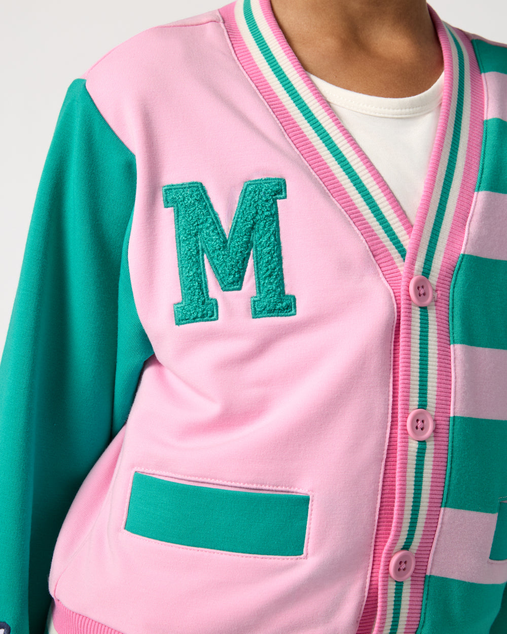 Close up of the button detail on the Disney Mickey Mouse Sports Club Varsity Cardigan