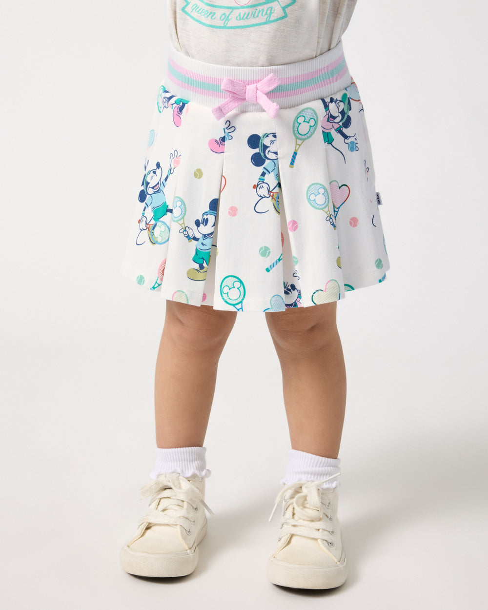 Girl wearing the Disney Mickey Mouse & Minnie Mouse Match Pleated Skort