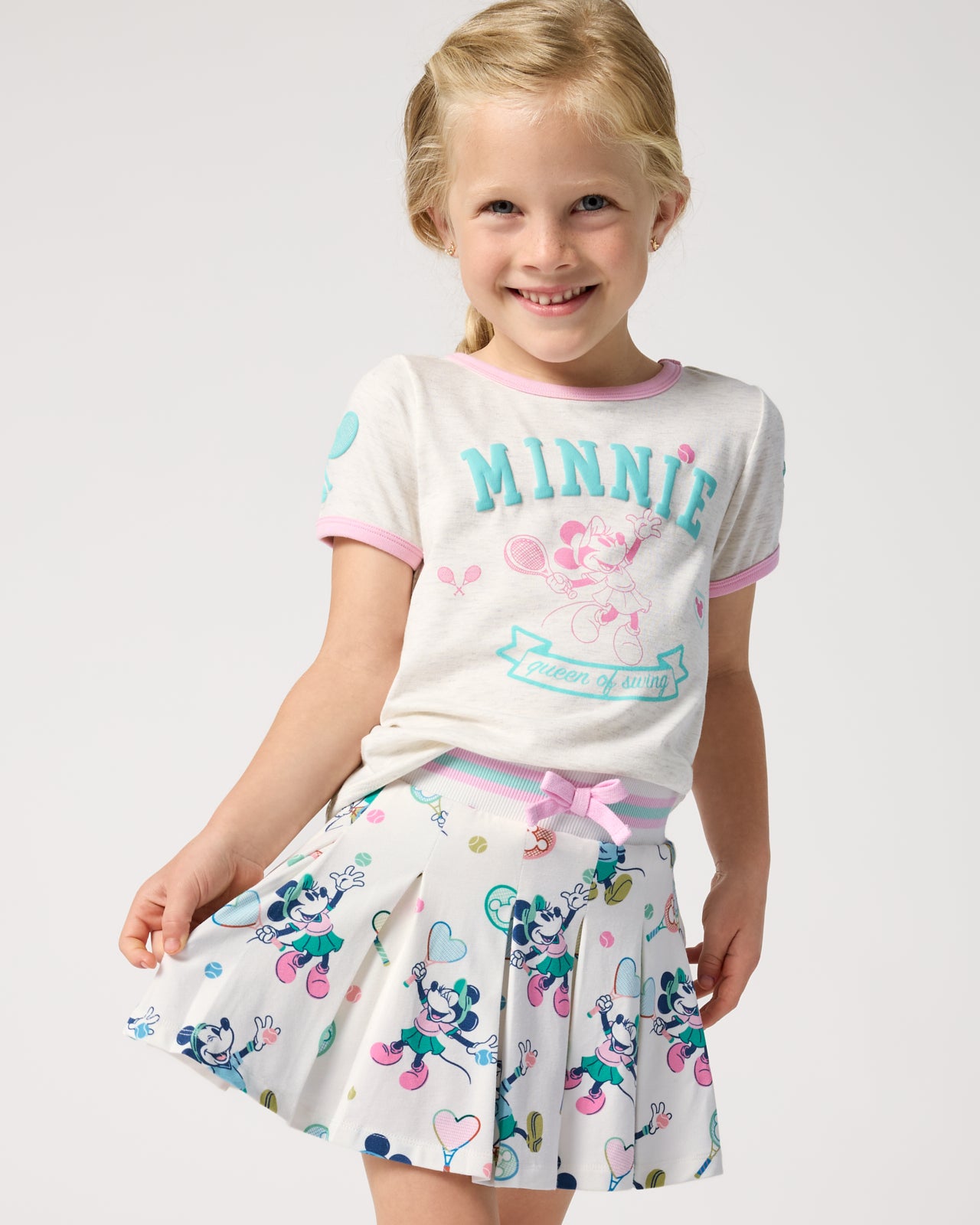 Girl wearing the Disney Mickey Mouse & Minnie Mouse Match Pleated Skort and Relaxed Tee