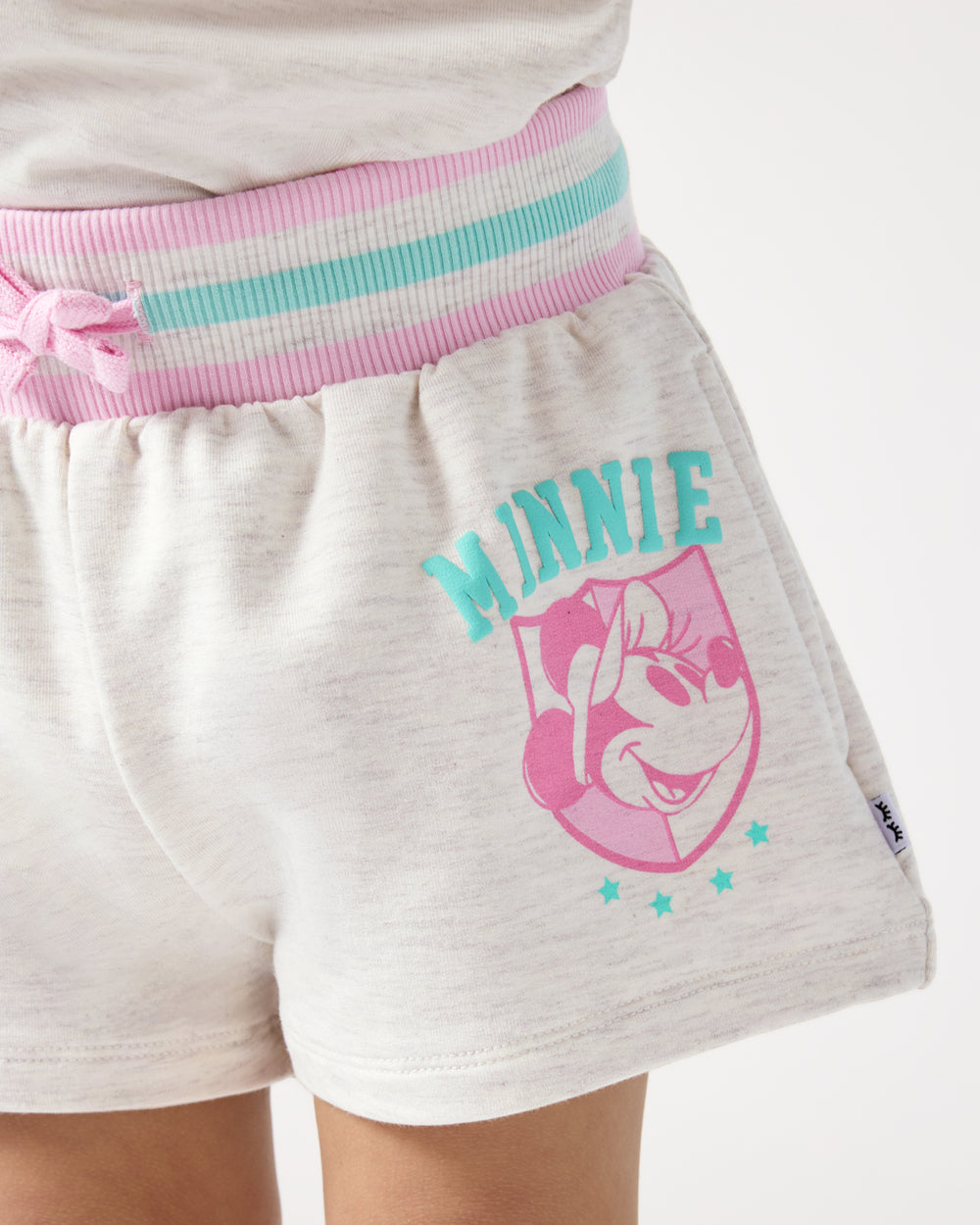 Close up of the graphic detail on the Disney Minnie Mouse Queen of Swing Athletic Short