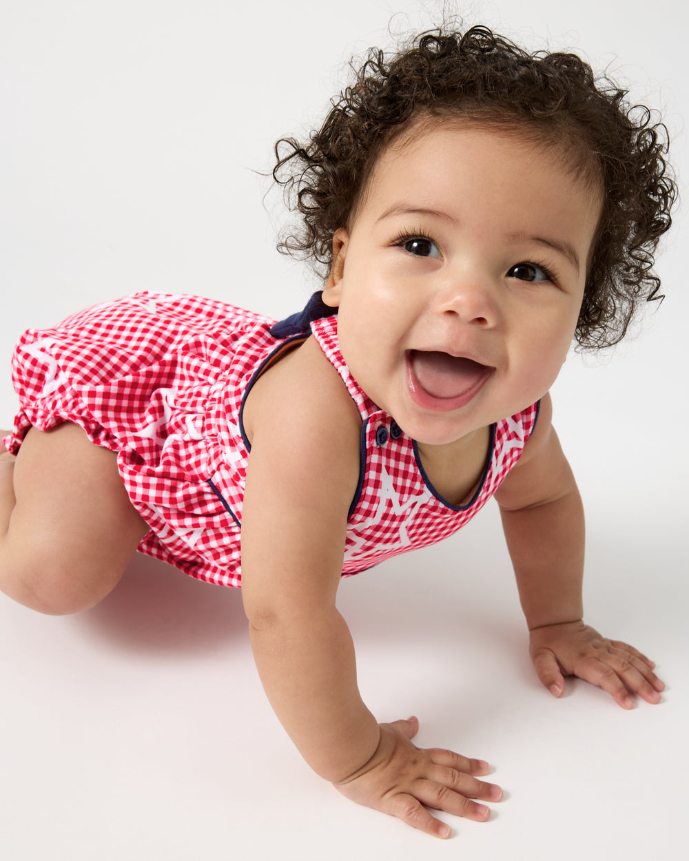 Alternate of crawling baby wearing the Celebration Gingham Bow Back Bubble Romper