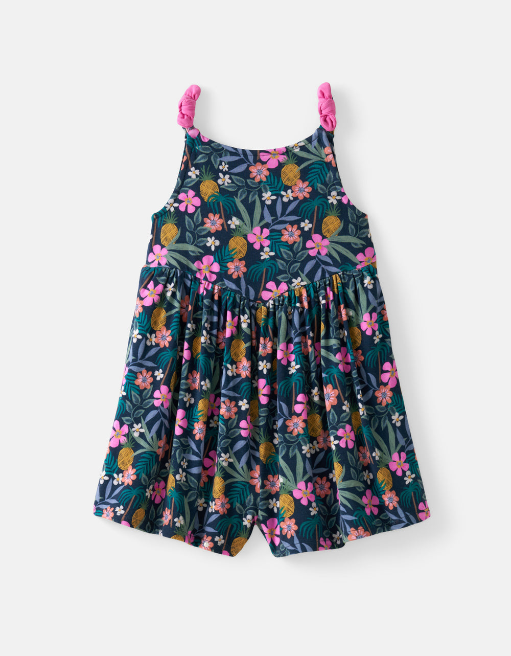 Flat lay of the Tropical Garden Bow Strap Romper