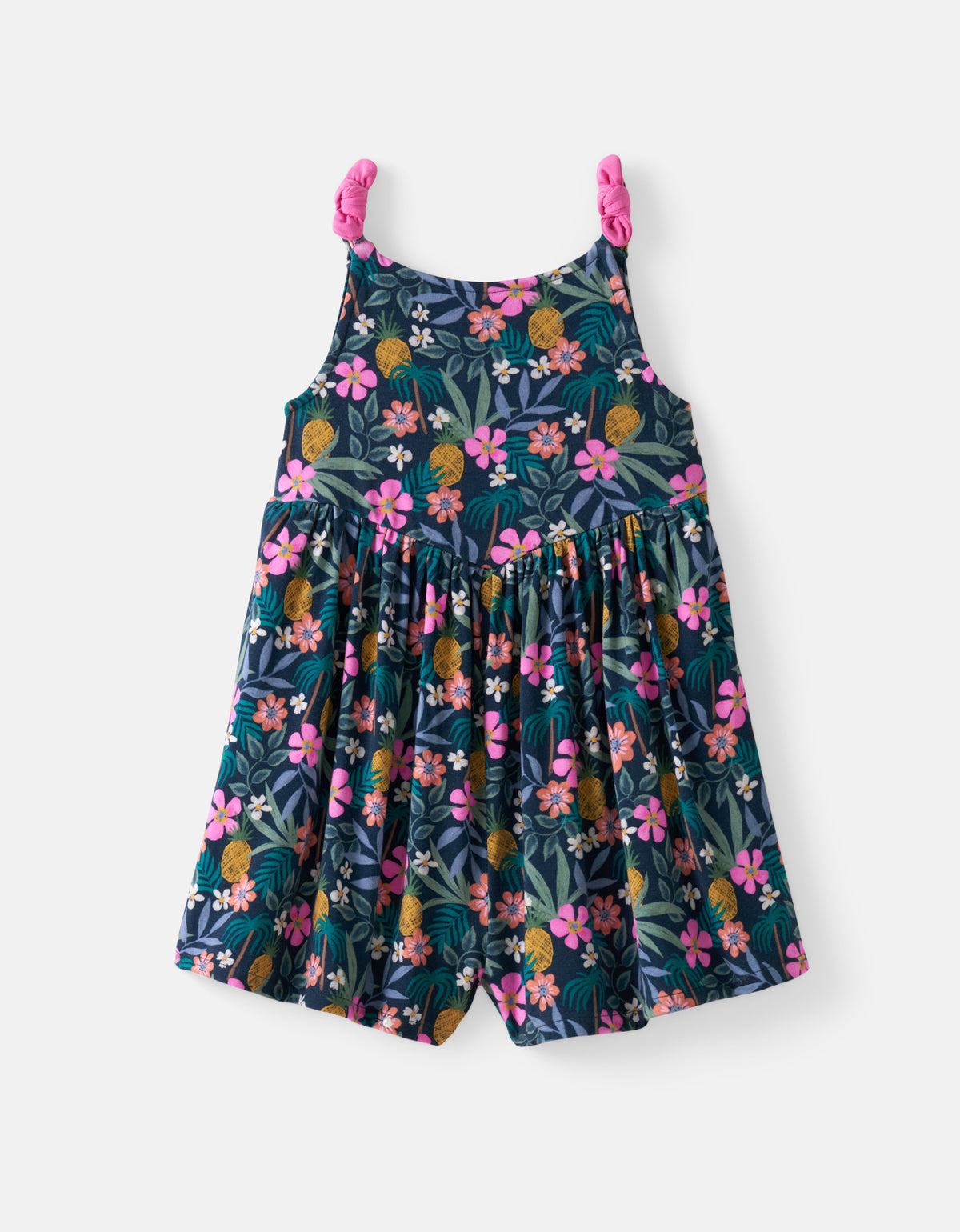 Flat lay of the Tropical Garden Bow Strap Romper