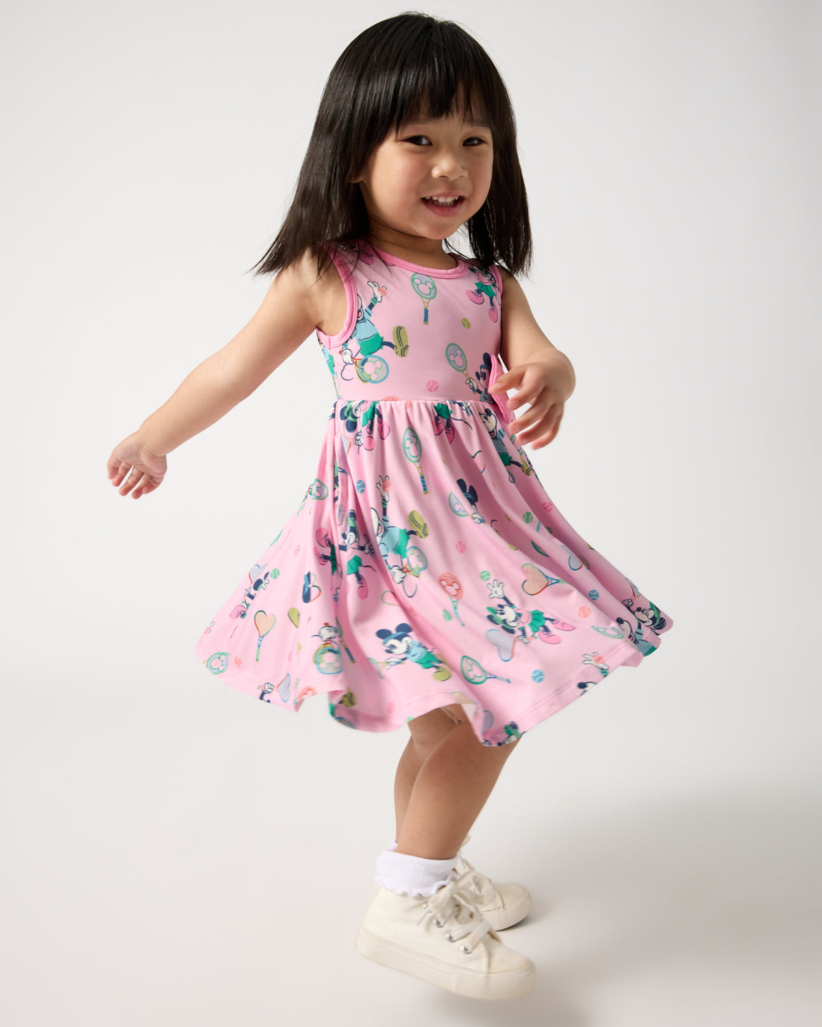 Twirling girl wearing the Disney Mickey Mouse & Minnie Mouse Match Twirl Dress