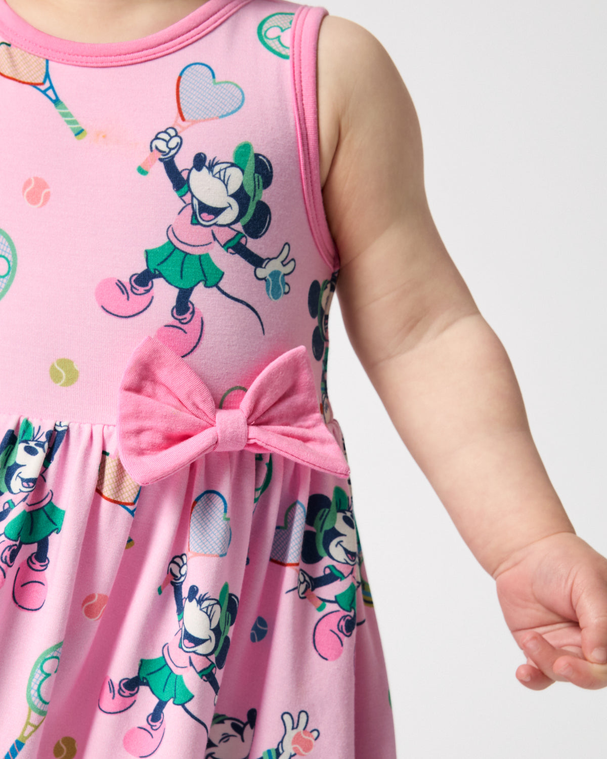 Close up of the bow detail on the Disney Mickey Mouse & Minnie Mouse Match Twirl Dress with Bodysuit