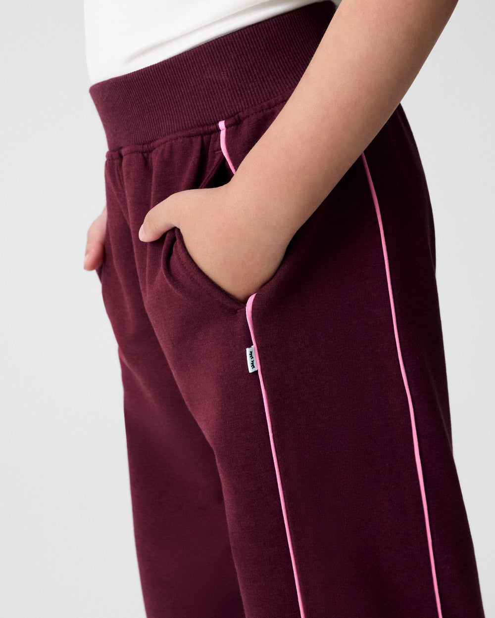 Close up of the pocket detail on the Classic Burgundy Wide Leg Pant