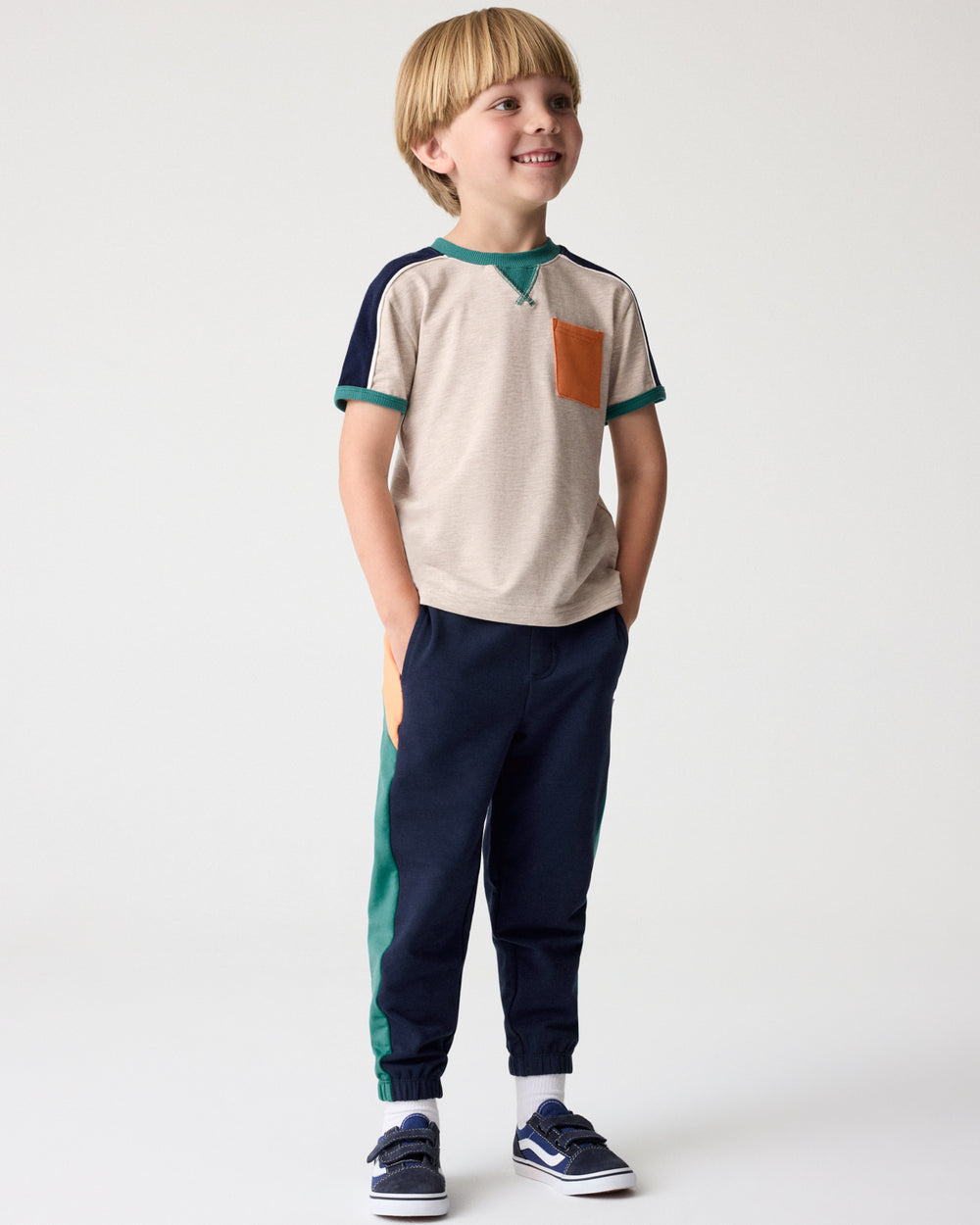 Boy wearing the Classic Navy Panel Jogger with a Linen Heather Tee