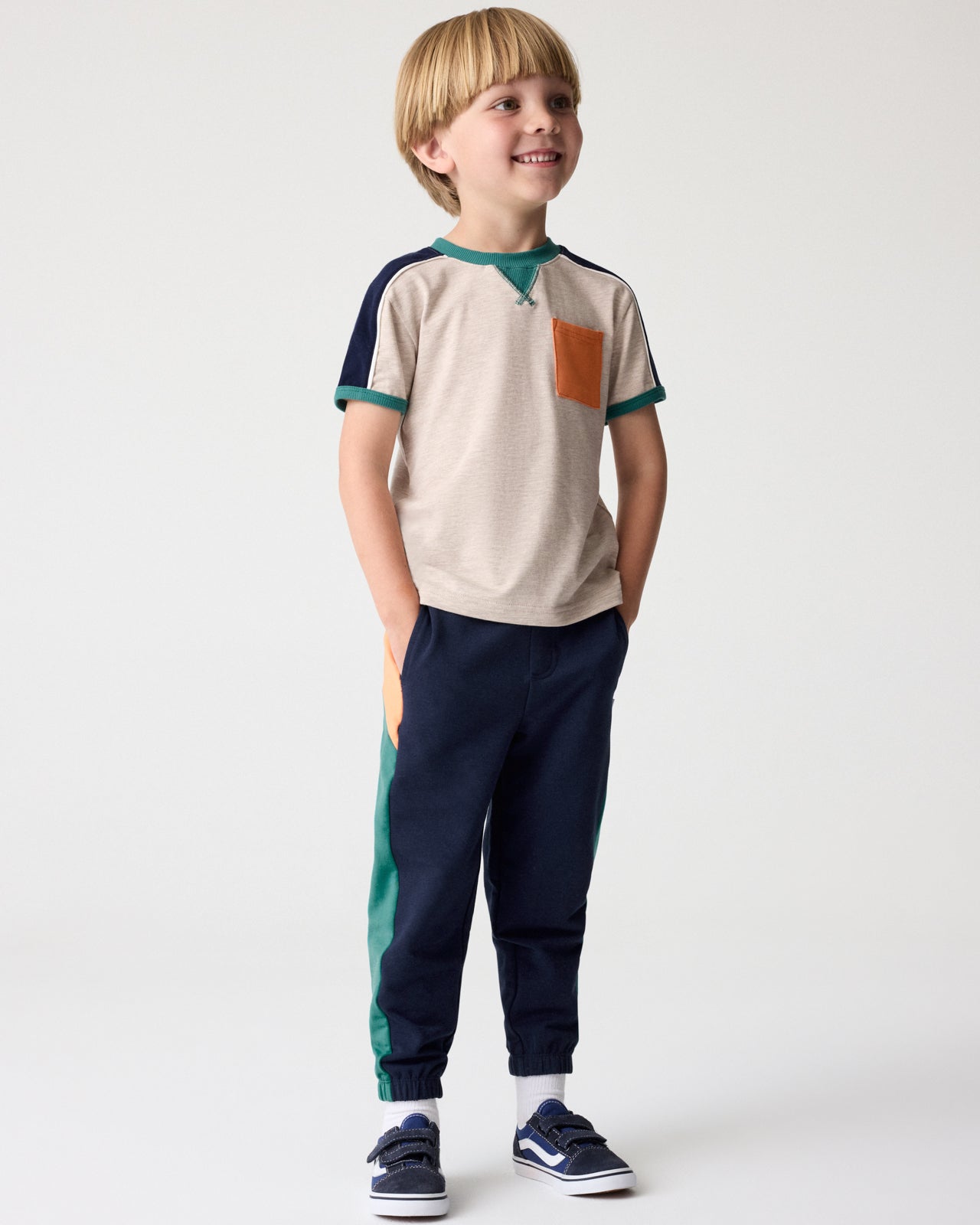 Boy wearing the Classic Navy Panel Jogger with a Linen Heather Tee