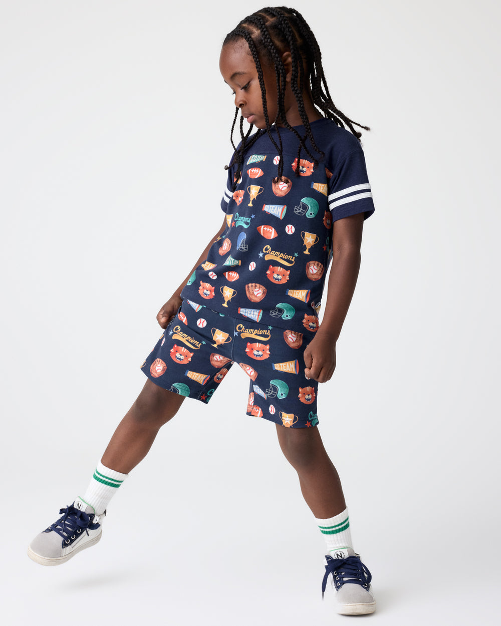 Boy wearing the Team Spirit Relaxed Tee and Drawstring Shorts