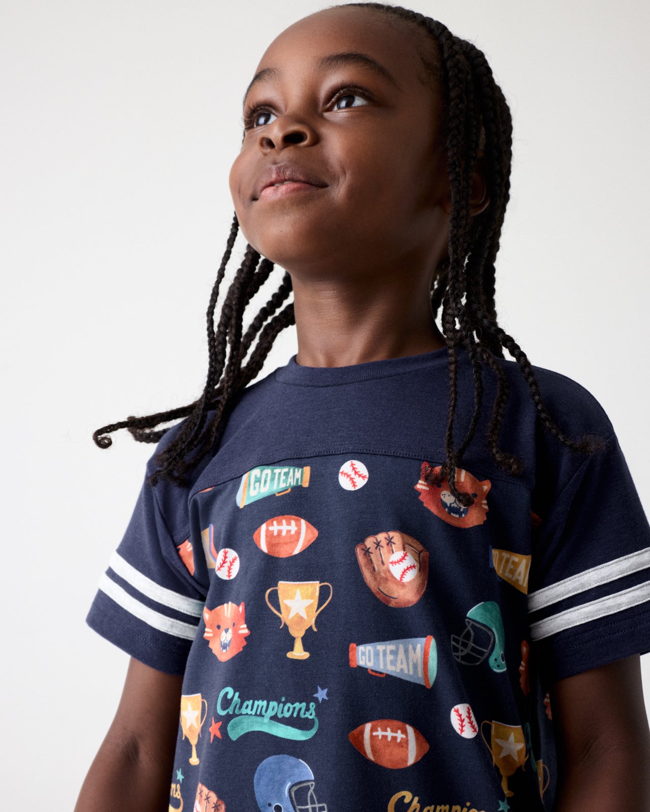 Close up of boy wearing the Team Spirit Relaxed Tee