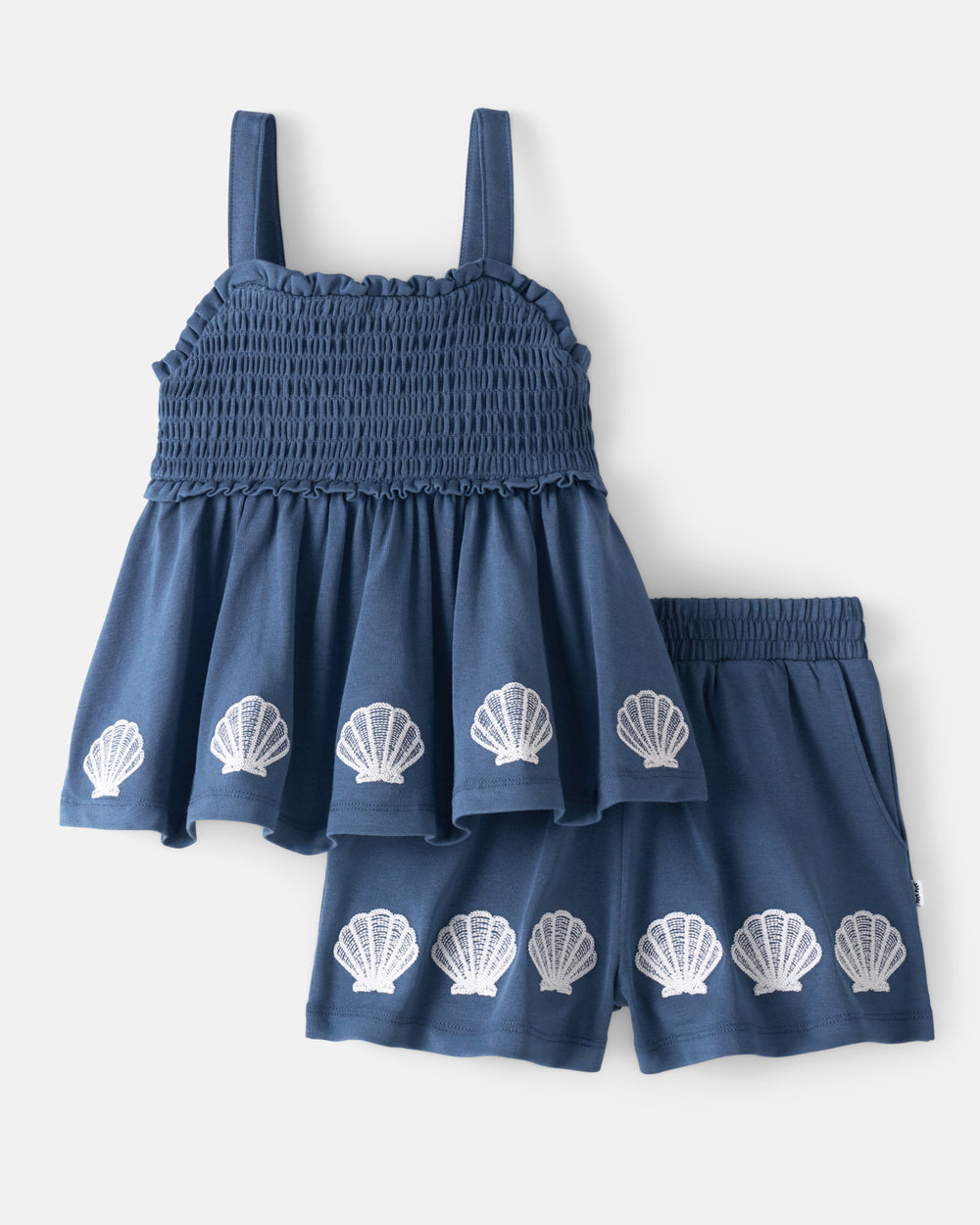 Flat lay of the Seashell Cove Smocked Tank & Shorts Set