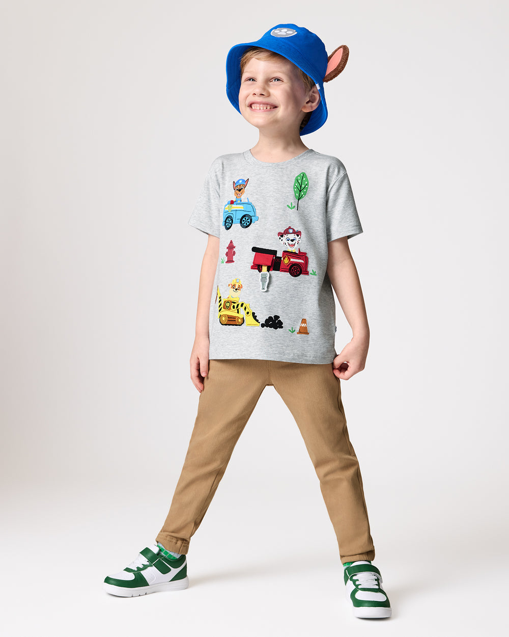 Boy wearing the PAW Patrol Chase Bucket Hat with a PAW Patrol boys tshirt
