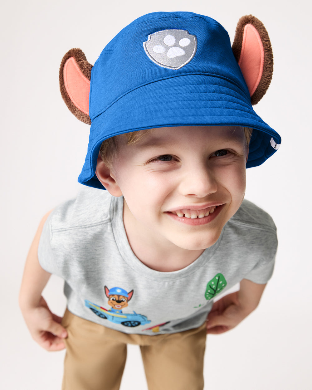 Boy wearing the PAW Patrol Chase Bucket Hat