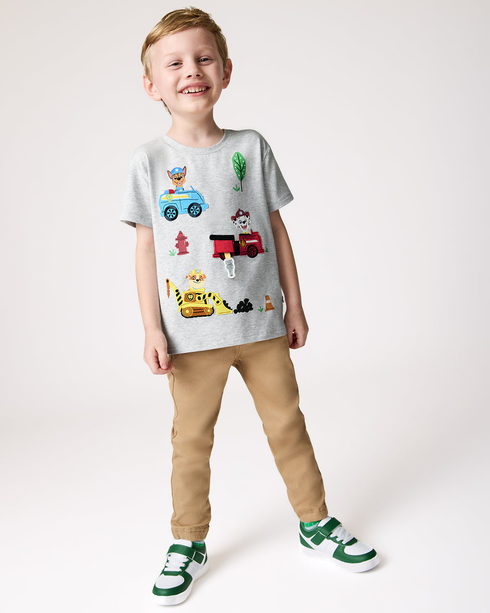 Boy wearing the PAW Patrol Rescue Ready Relaxed Tee with khaki joggers