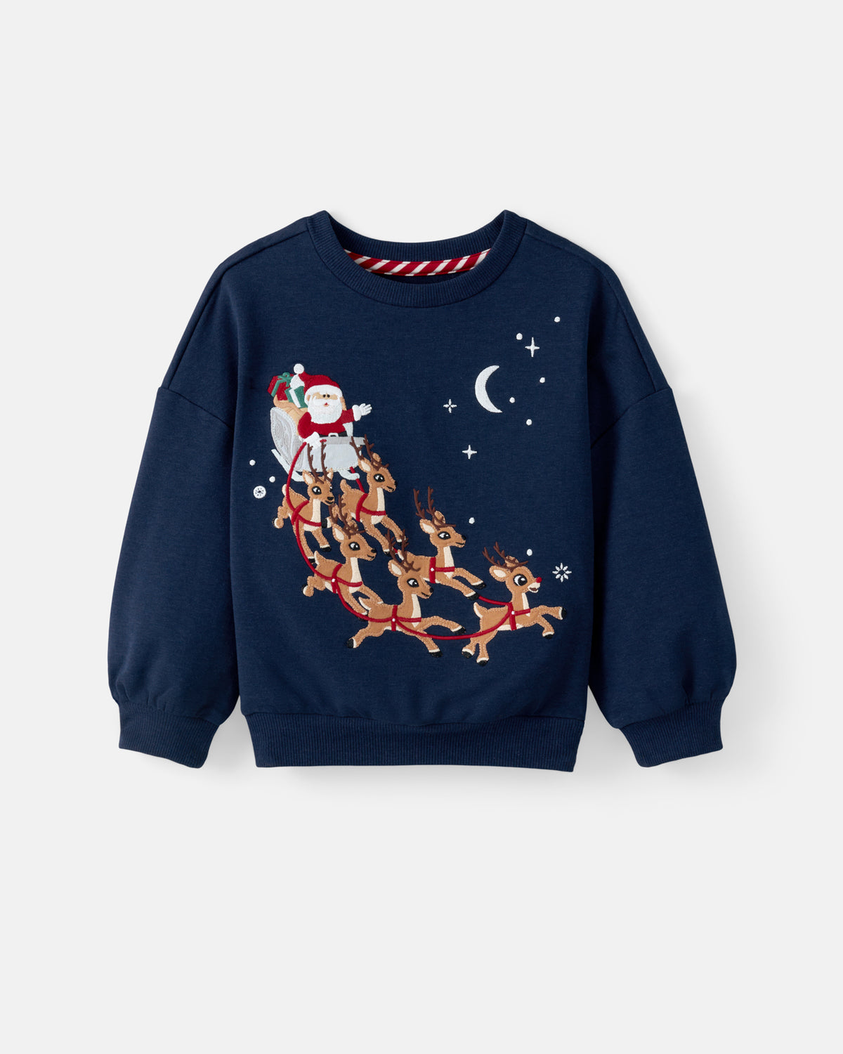 A navy blue crewneck sweatshirt featuring a festive Christmas graphic of Santa Claus riding in a sleigh pulled by reindeer under a crescent moon and stars.