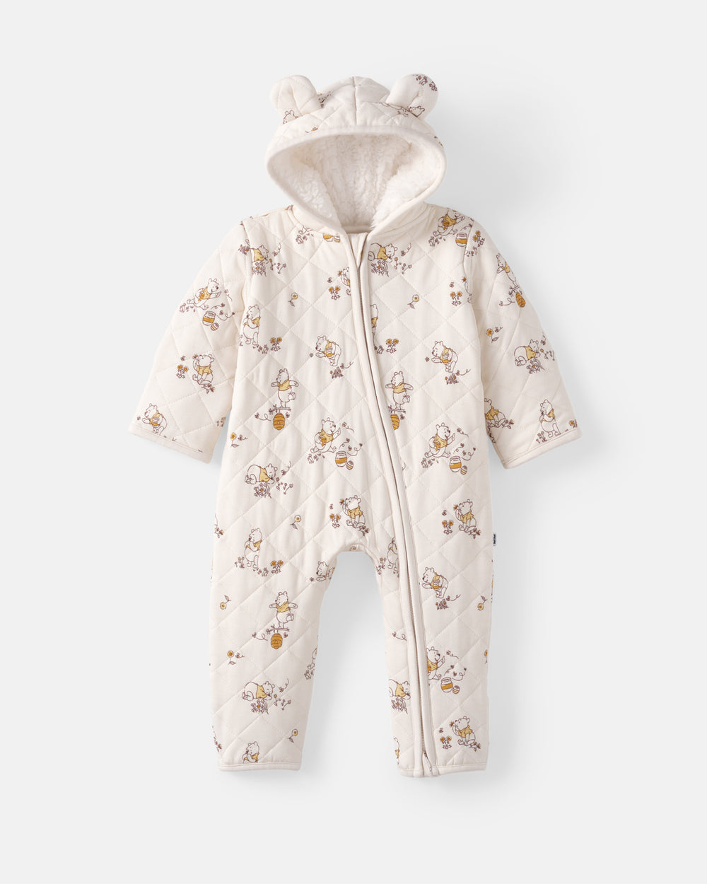 A baby quilted hooded one-piece sleeper in cream with a small brown and yellow animal print, featuring a front zipper and bear ears on the hood, shown against a light gray background.