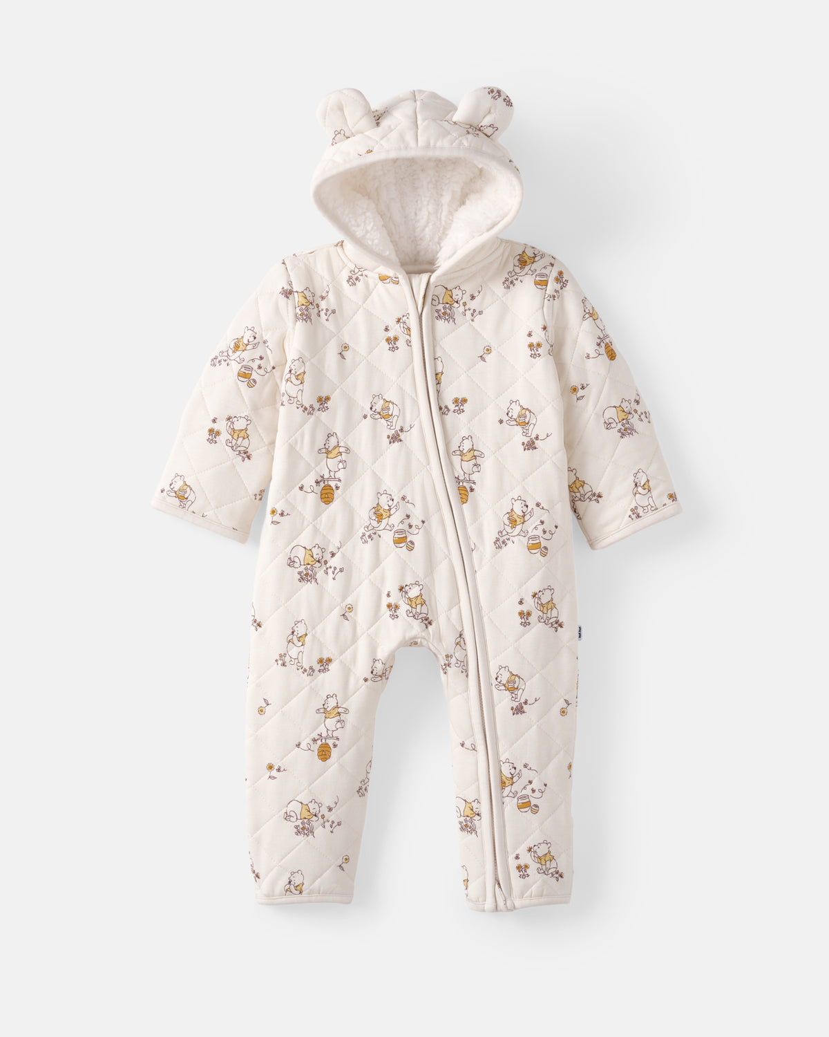 A baby quilted hooded one-piece sleeper in cream with a small brown and yellow animal print, featuring a front zipper and bear ears on the hood, shown against a light gray background.