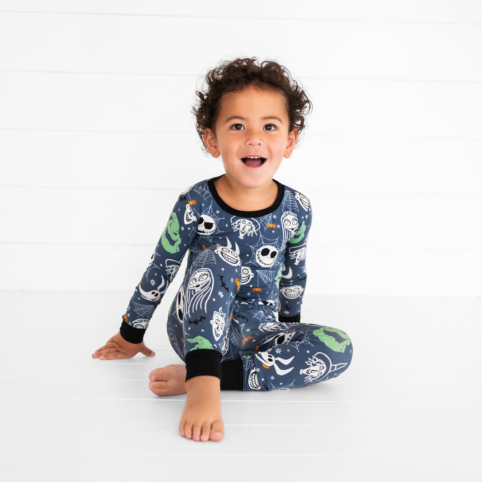 Alternate image of a child sitting while wearing the Disney Jack & Crew Two-Piece Pajama Set